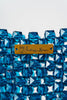 Bolso con cuentas hechas a mano y acrílico azul