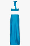 Rear view of the Aluna Dress, featuring an open back and seamless one-shoulder construction.