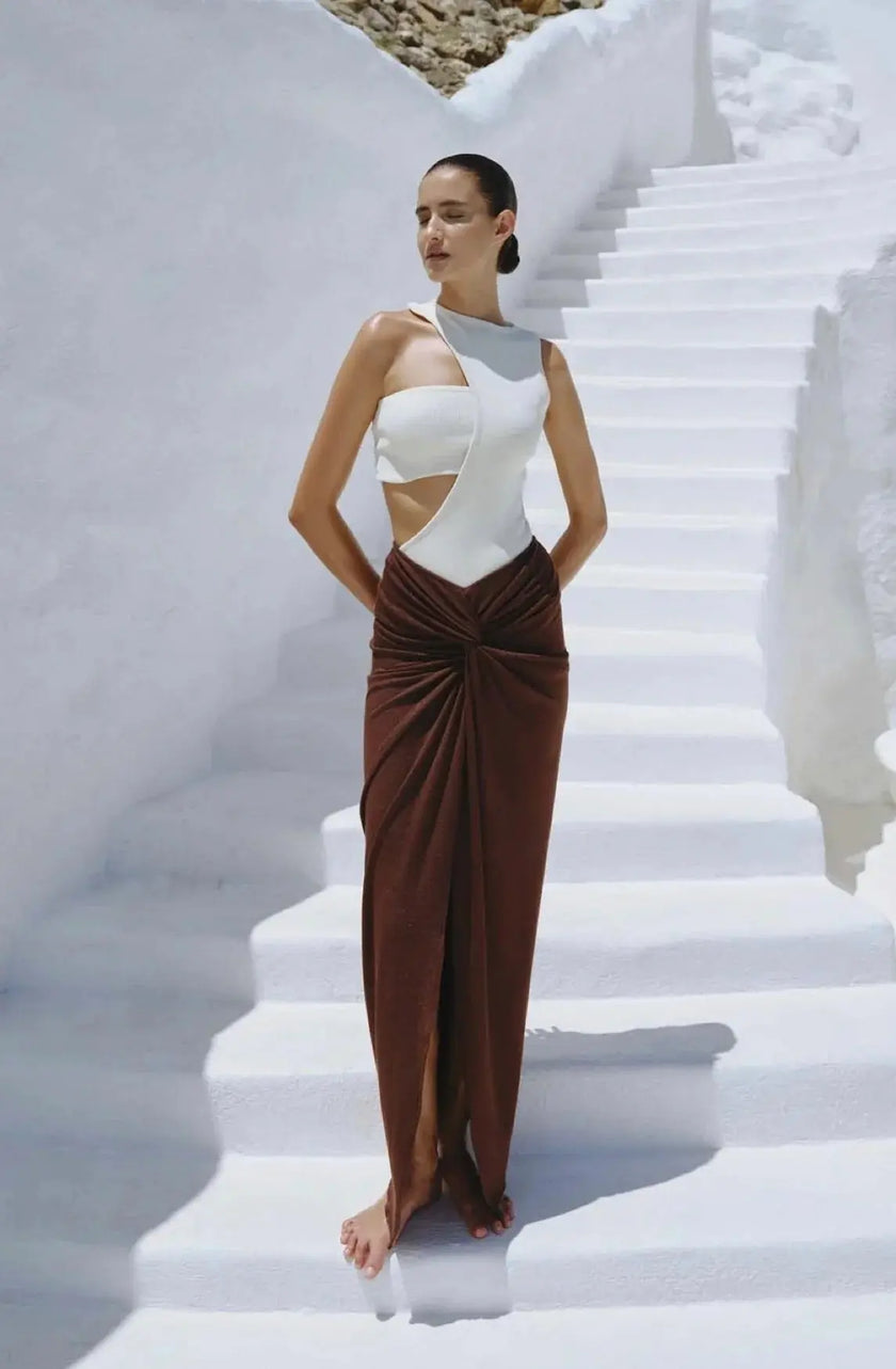 Model wearing the Wasabi-colored Bianca Body, showcasing its asymmetrical cutouts and one-shoulder design.