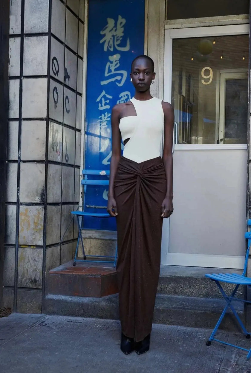 Side view of the Bianca Body in Wasabi, emphasizing the figure-hugging fit and unique cutout details.