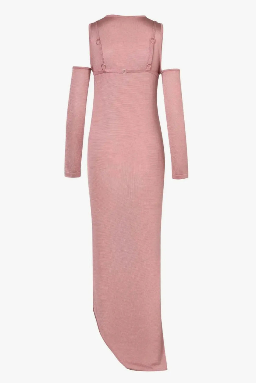 Side view of the Della Dress, emphasizing the figure-hugging fit and maxi length.