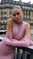 Rear view of the Della Dress, revealing the detachable top and unique layered look.