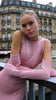 Rear view of the Della Dress, revealing the detachable top and unique layered look.
