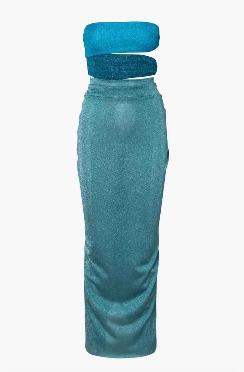 Side view of the Isla Maxi Dress in Natal, emphasizing the figure-hugging fit and side slit.