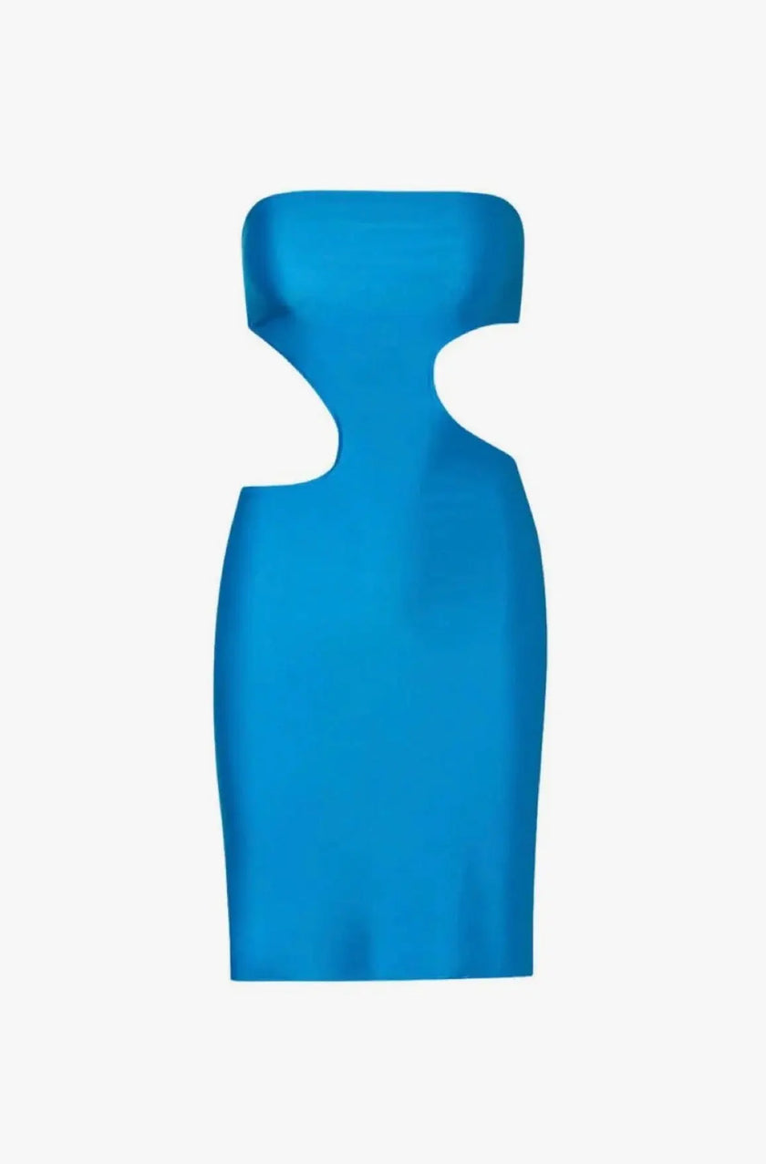 Side view of the Mambo Asymmetric Mini Dress in Azulado, emphasizing the figure-hugging fit and asymmetric cutout detail.