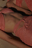 Side view of the Noah Pareo in Rosatua, emphasizing the elegant drape and semi-sheer material.