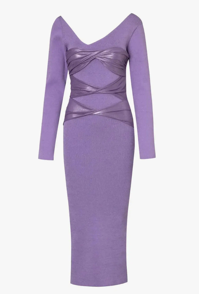 Rear view of the Oleada Dress, revealing the open-back style and seamless integration of knit and glossy fabrics.