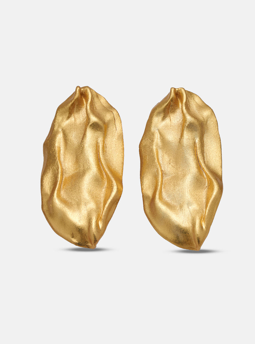 Front view of the Bimy earrings against a white background, showcasing their fluid, handcrafted gold silhouette.