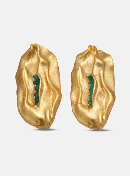 Front view of the Bimy Emerald Earrings against a white background, featuring sculptural gold surfaces with vertically embedded emeralds.