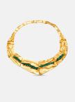 Front view of the Bimy necklace against a white background, handcrafted in bronze with 24k gold plating and Colombian emeralds.