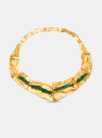 Front view of the Bimy necklace against a white background, handcrafted in bronze with 24k gold plating and Colombian emeralds.