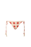 Beige bikini bottom with red starburst pattern on a white background