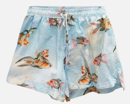 Skirt with fish and floral pattern on a light blue background