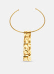 Back view of the Moky necklace pendant, revealing the handcrafted structure and connecting elements in gold-plated bronze.