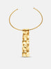 Back view of the Moky necklace pendant, revealing the handcrafted structure and connecting elements in gold-plated bronze.