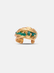 Front-facing view of the Monky earcuff showcasing natural emeralds set in gold with sculptural texture.