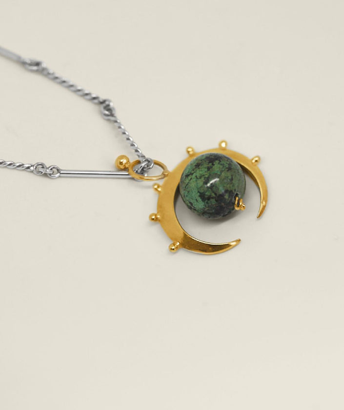 <strong>AYSHA BILGRAMI </strong><br>Crescent Pedant African Turquoise in Gold